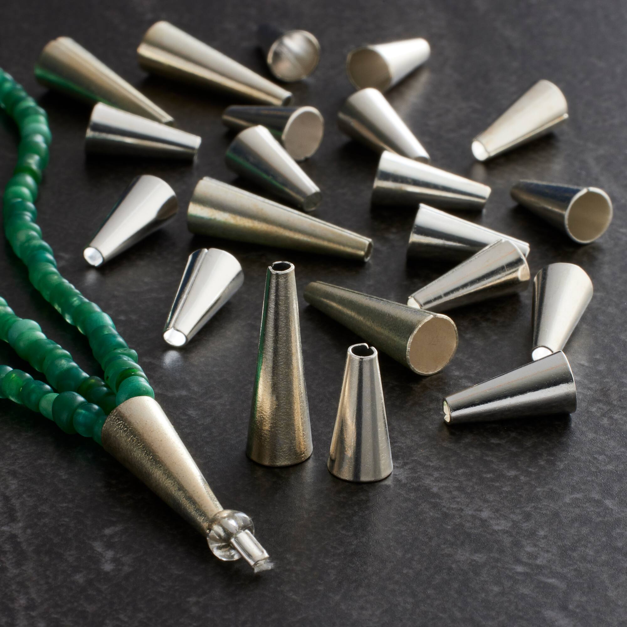 12 Packs: 23 ct. (276 total) Smooth Silver Bead Cones by Bead Landing™